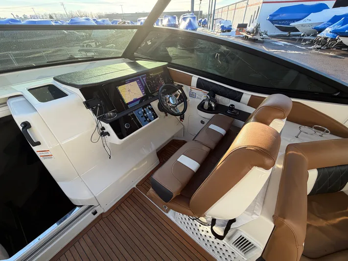 Yacht Photos Pics Interior of 2019 Sea Ray 320 Sundancer with modern helm console.