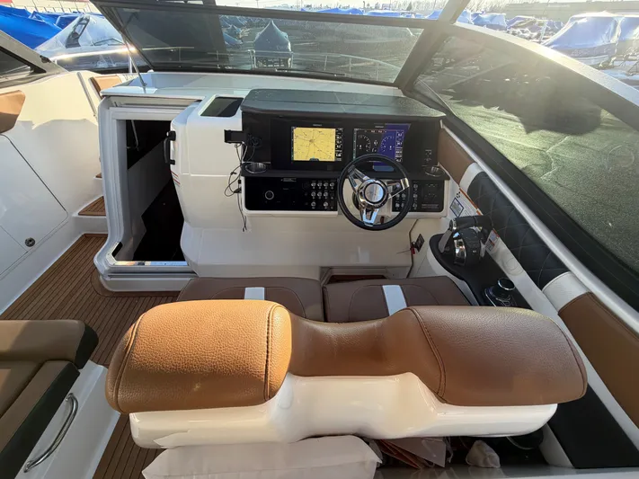  Yacht Photos Pics 2019 Sea Ray 320 Sundancer cockpit with modern controls.