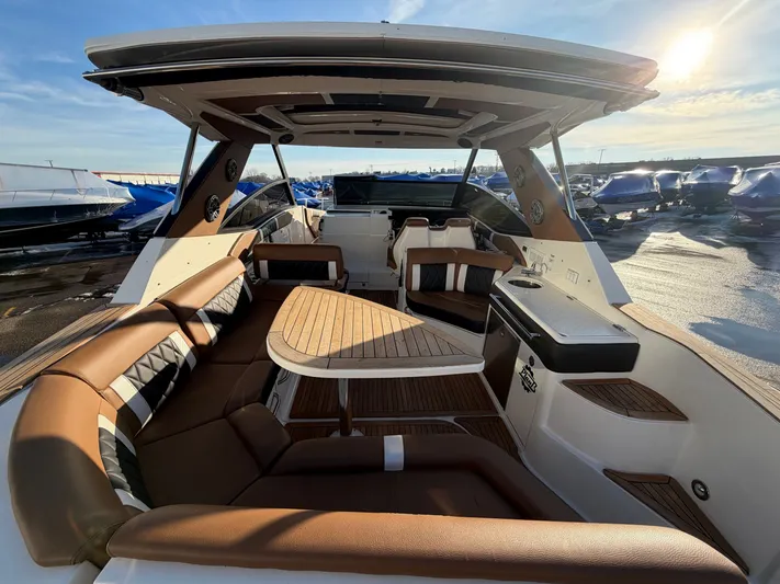  Yacht Photos Pics Interior of a 2019 Sea Ray 320 Sundancer yacht at sunset.
