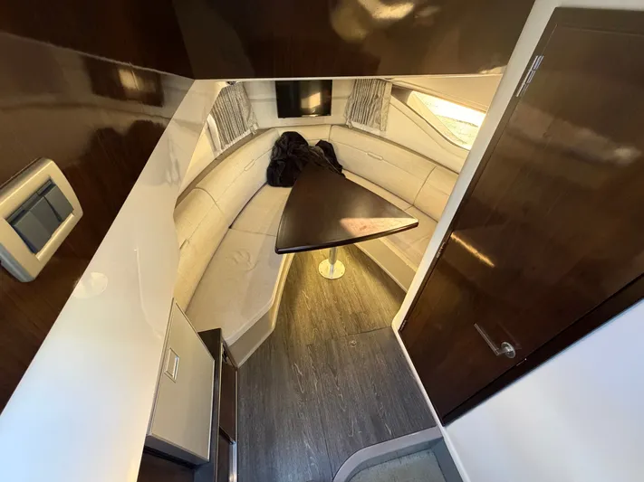  Yacht Photos Pics Interior of 2019 Sea Ray 320 Sundancer with elegant seating area.