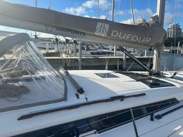 Epiphany Yacht Photos Pics 2022 Dufour 430 sailboat docked at marina, featuring sleek design and modern rigging.