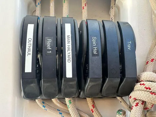 Epiphany Yacht Photos Pics Sailing rope clutches labeled for outhaul, reef, halyard, and traveler on a 2022 Dufour 430.