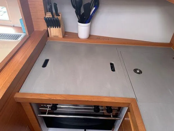 Epiphany Yacht Photos Pics Modern kitchen area in 2022 Dufour 430 yacht with stove and utensils.