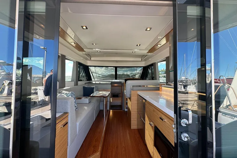 Pal Agua Yacht Photos Pics Luxurious interior of 2023 Tiara Yachts C39 Coupe with modern furnishings and sleek design.