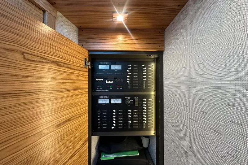 Pal Agua Yacht Photos Pics Electrical panel inside 2023 Tiara Yachts C39 Coupe, featuring AC and DC systems.