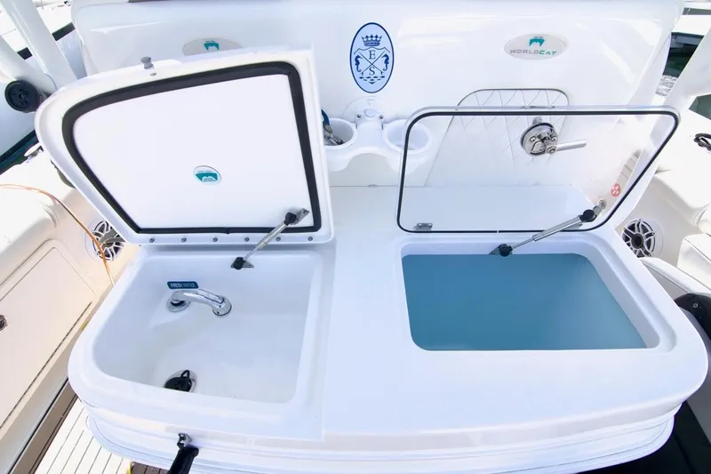 Yacht Photos Pics 2023 World Cat 325 CC boat sink and storage compartments.
