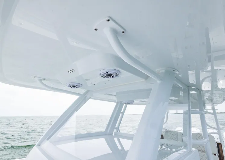  Yacht Photos Pics 2025 Invincible 43 Open Fisherman boat with sleek design and modern features on the water.