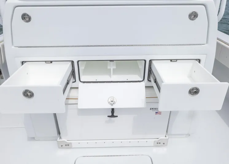  Yacht Photos Pics 2025 Invincible 43 Open Fisherman boat storage compartments with open drawers.