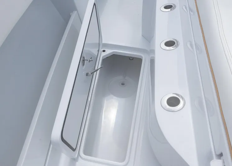  Yacht Photos Pics 2025 Invincible 43 Open Fisherman boat storage compartment with rod holders.