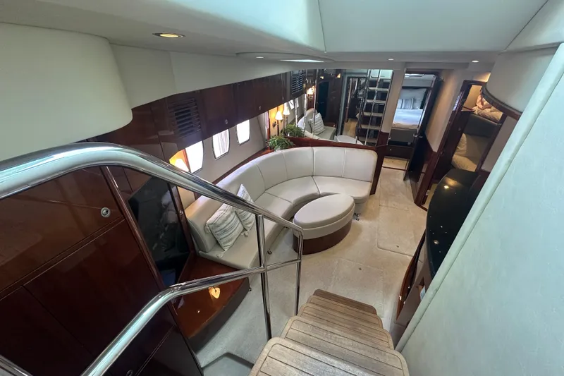 Knot Rite Yacht Photos Pics Luxurious interior of 2009 Sea Ray 60 Sundancer yacht with elegant seating and modern design.