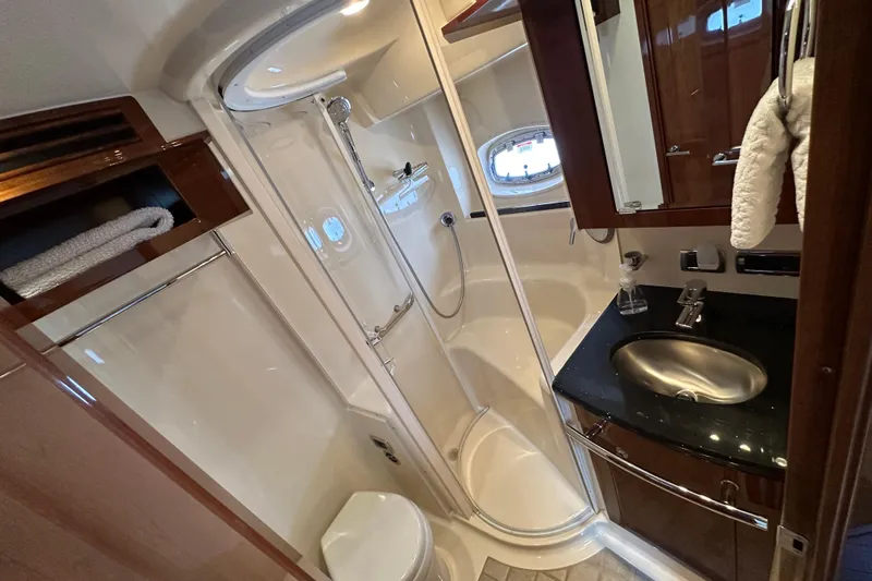 Knot Rite Yacht Photos Pics Luxurious bathroom in 2009 Sea Ray 60 Sundancer yacht with shower and sink.
