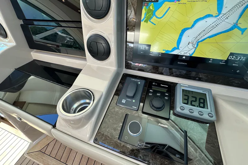 Knot Rite Yacht Photos Pics Control panel of a 2009 Sea Ray 60 Sundancer with navigation and depth display.