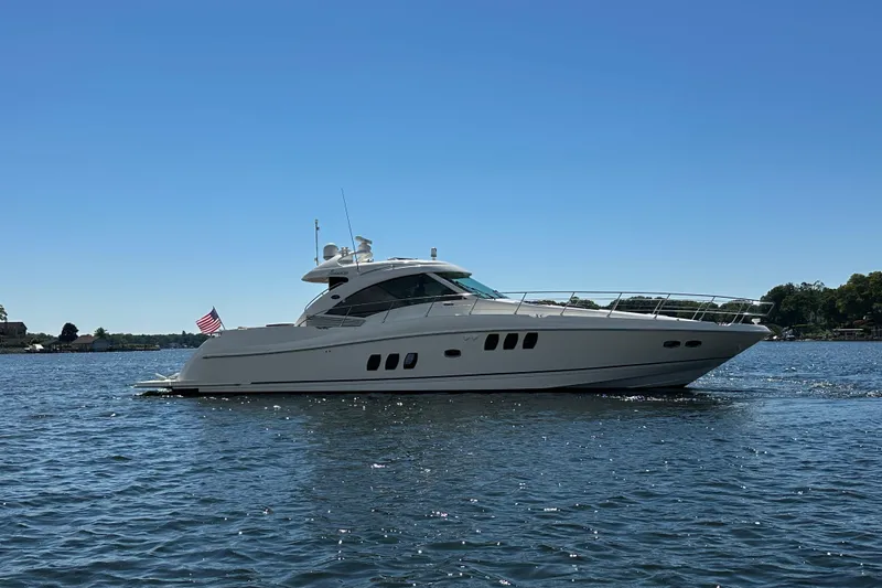 Knot Rite Yacht Photos Pics 2009 Sea Ray 60 Sundancer yacht cruising on a sunny day.