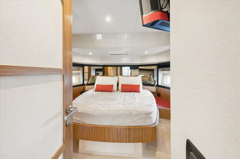 Tangerine Moon Yacht Photos Pics Luxurious bedroom interior of 2014 Azimut Magellano 43 yacht with modern design.