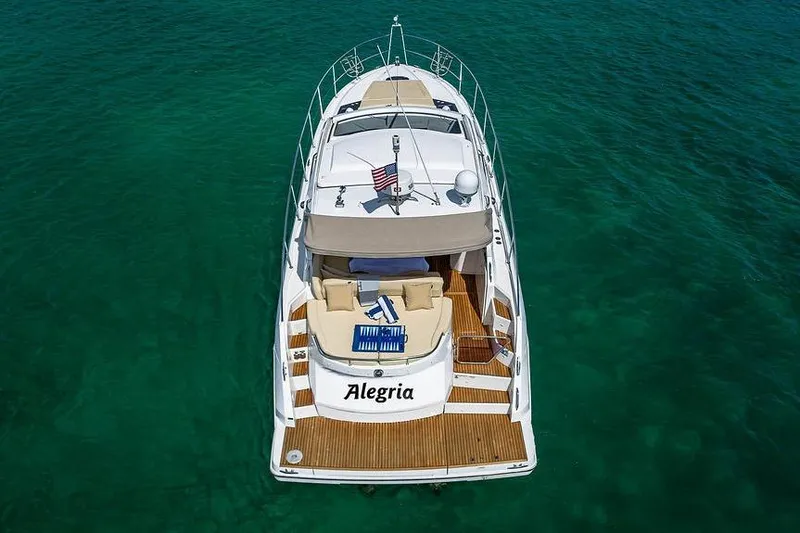 Alegria Yacht Photos Pics 2015 Beneteau Gran Turismo 44 yacht "Alegria" on clear turquoise water.