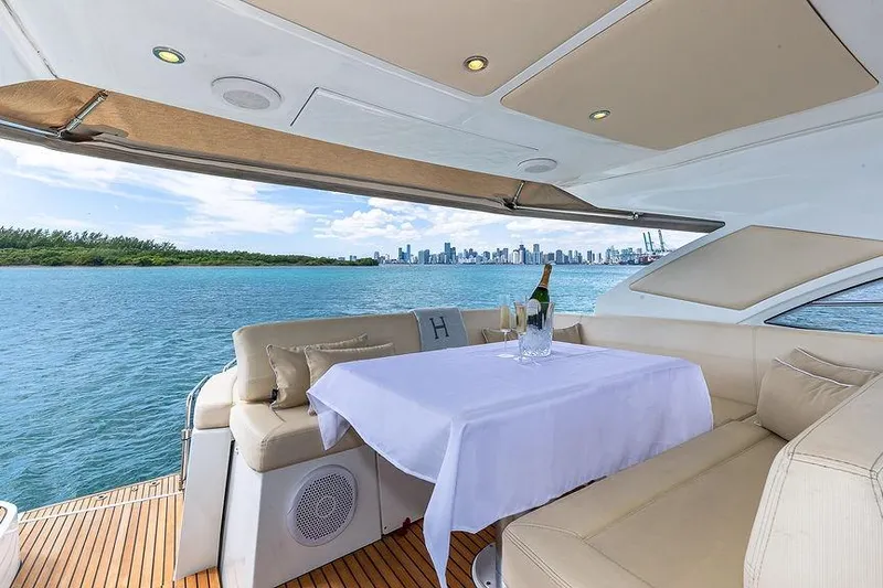 Alegria Yacht Photos Pics Luxurious 2015 Beneteau Gran Turismo 44 yacht interior with ocean view and city skyline.