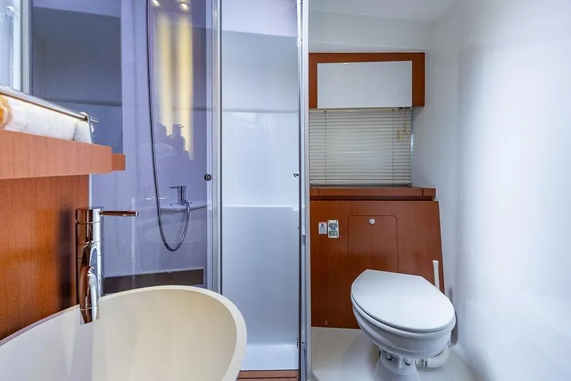 Alegria Yacht Photos Pics Luxurious bathroom interior of 2015 Beneteau Gran Turismo 44 yacht, featuring modern fixtures.