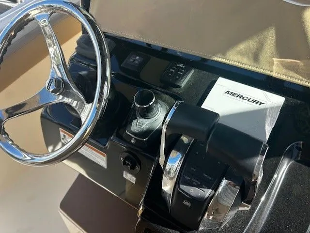  Yacht Photos Pics Control console of a 2022 Scout 305 LXF boat.