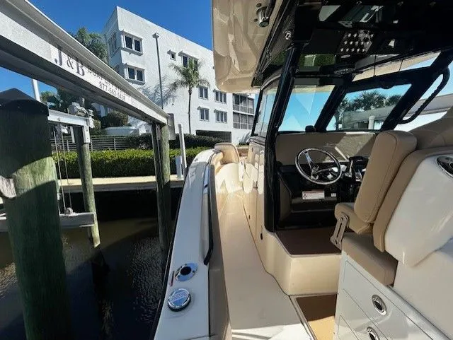  Yacht Photos Pics Scout 305 LXF 2022 boat docked with modern interior.