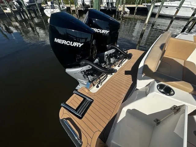  Yacht Photos Pics Scout 305 LXF 2022 with Mercury engines at dock.