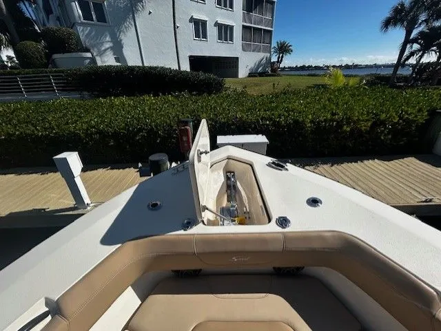  Yacht Photos Pics Scout 305 LXF 2022 at dock with waterfront view.