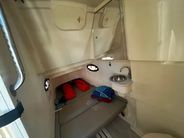  Yacht Photos Pics Interior of 2022 Scout 305 LXF with seating and sink.