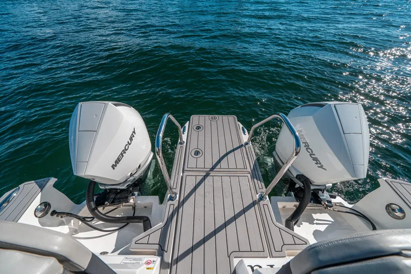 Era Ora Yacht Photos Pics Aquila 32 Sport 2022 boat with dual Mercury outboard engines on water.