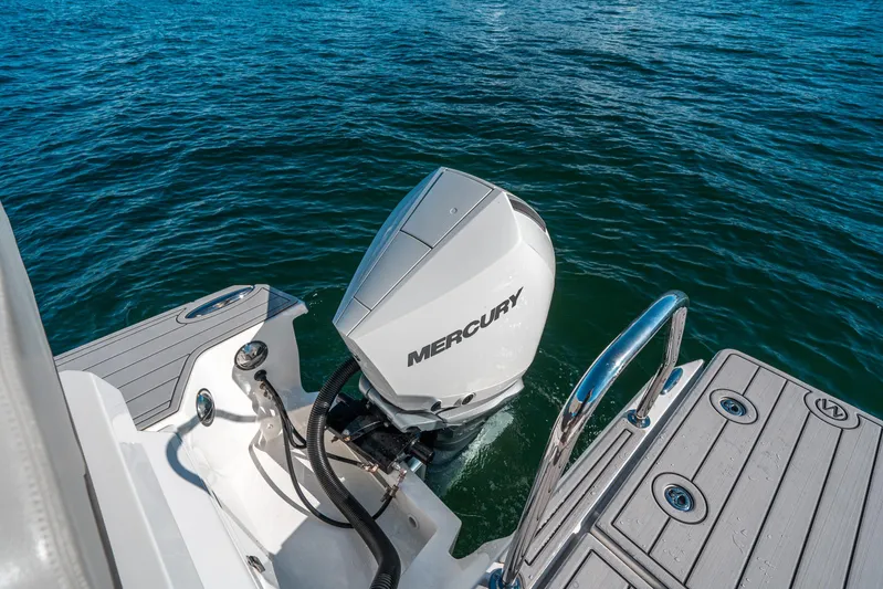 Era Ora Yacht Photos Pics Aquila 32 Sport 2022 boat with Mercury outboard motor on water.