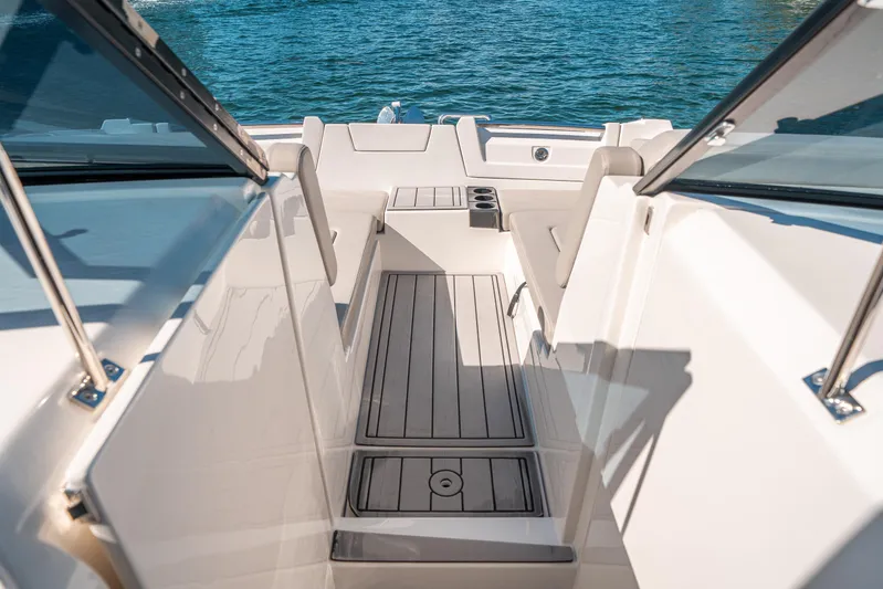 Era Ora Yacht Photos Pics Aquila 32 Sport 2022 boat interior with sleek design and open deck view.