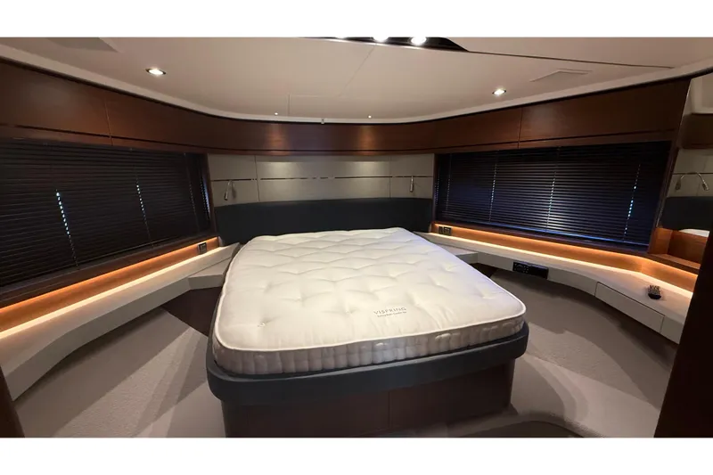 Stra Dodo Yacht Photos Pics Luxurious bedroom interior of 2019 Princess S65 yacht with modern design and ambient lighting.