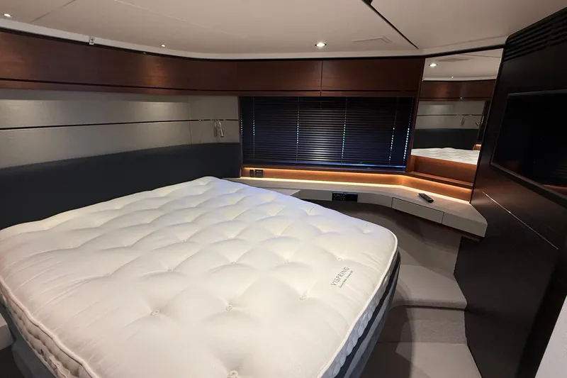 Stra Dodo Yacht Photos Pics Luxurious bedroom interior of 2019 Princess S65 yacht with plush mattress and modern design.