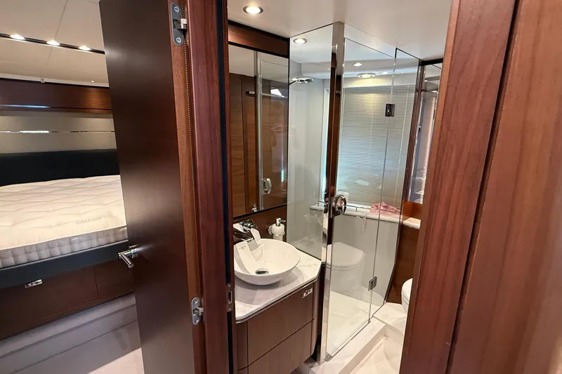 Stra Dodo Yacht Photos Pics Luxurious 2019 Princess S65 yacht interior with elegant bathroom and bedroom.