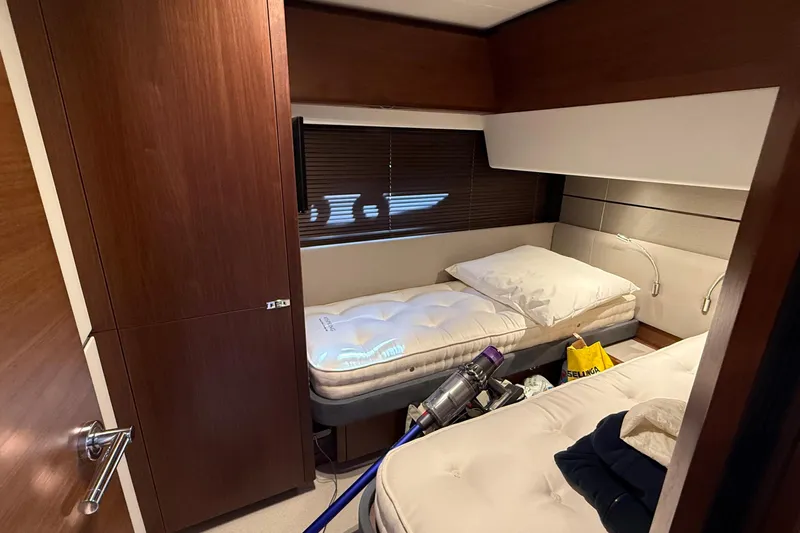 Stra Dodo Yacht Photos Pics Luxurious 2019 Princess S65 yacht cabin with twin beds and elegant wood finishes.