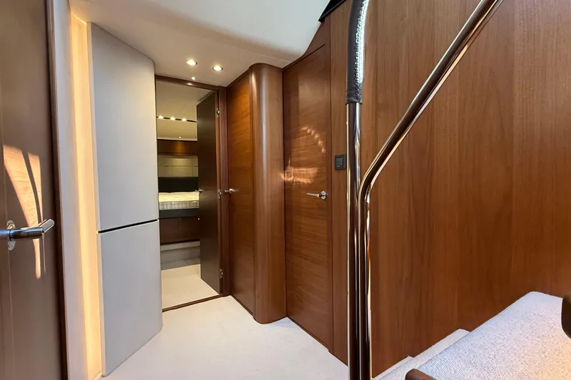 Stra Dodo Yacht Photos Pics Luxurious interior of 2019 Princess S65 yacht with wooden finishes and modern design.