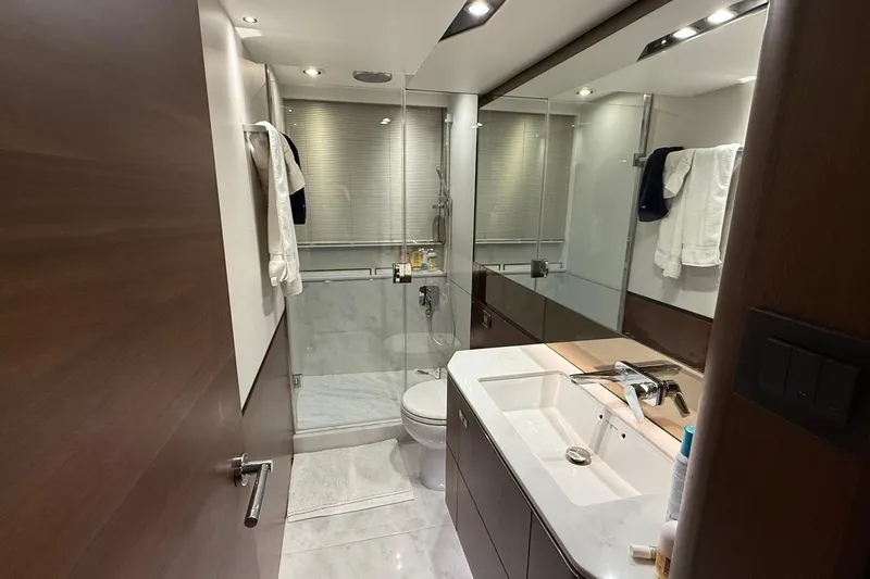Stra Dodo Yacht Photos Pics Luxurious bathroom in 2019 Princess S65 yacht with modern fixtures and elegant design.