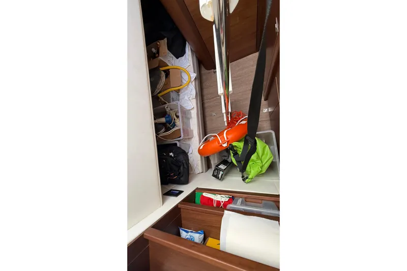 Stra Dodo Yacht Photos Pics Storage area on 2019 Princess S65 yacht with life ring and equipment.