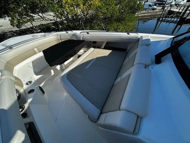  Yacht Photos Pics Boston Whaler 350 EX 2021, luxurious boat seating area with table.