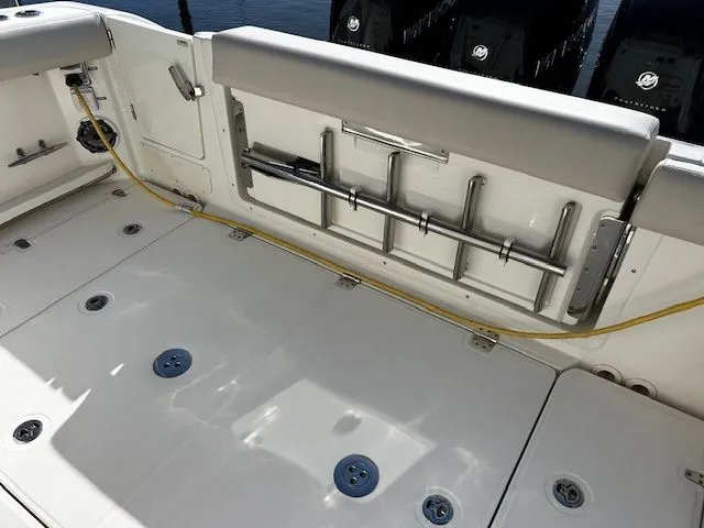  Yacht Photos Pics Interior of a 2021 Boston Whaler 350 EX boat with rod holders.