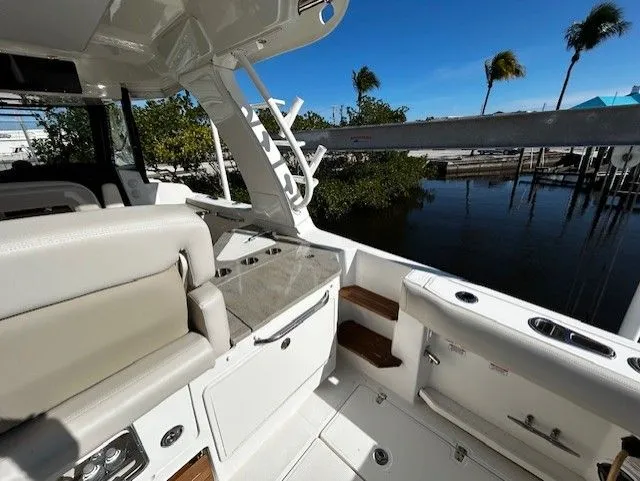  Yacht Photos Pics Interior of 2021 Boston Whaler 350 EX with seating area and water view.
