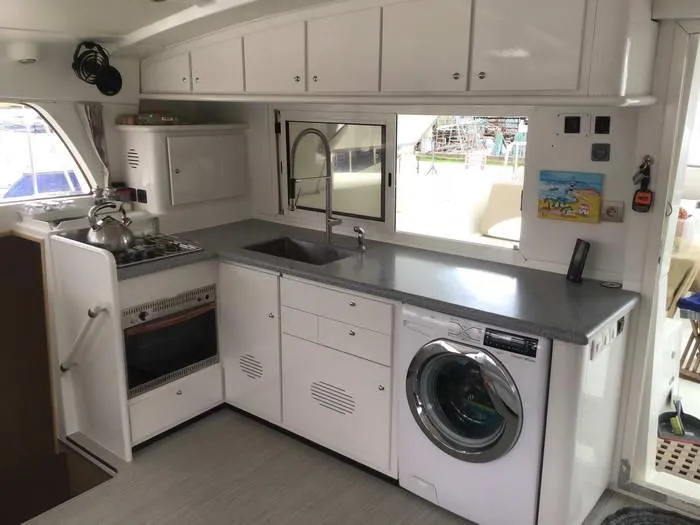 Katarina Yacht Photos Pics Modern kitchen in a 2010 Lagoon 440 yacht with appliances and sleek design.