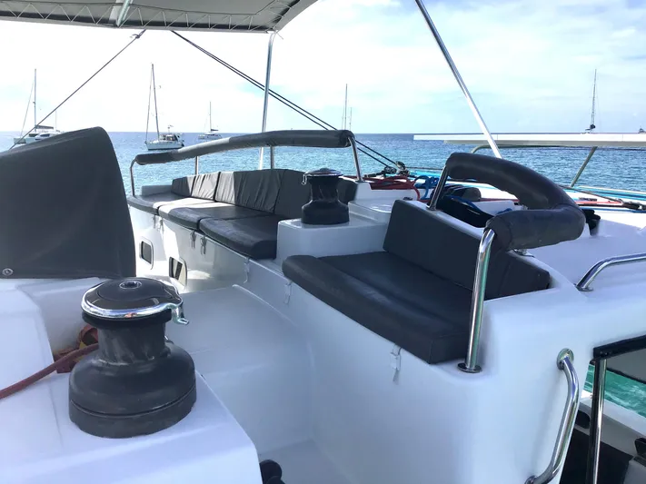 Katarina Yacht Photos Pics 2010 Lagoon 440 catamaran deck with seating, ocean view, and winches.