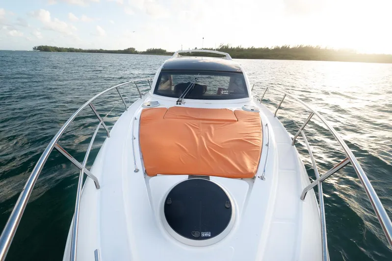  Yacht Photos Pics 2018 Schaefer 400 Sport yacht on open water with orange sunbed.