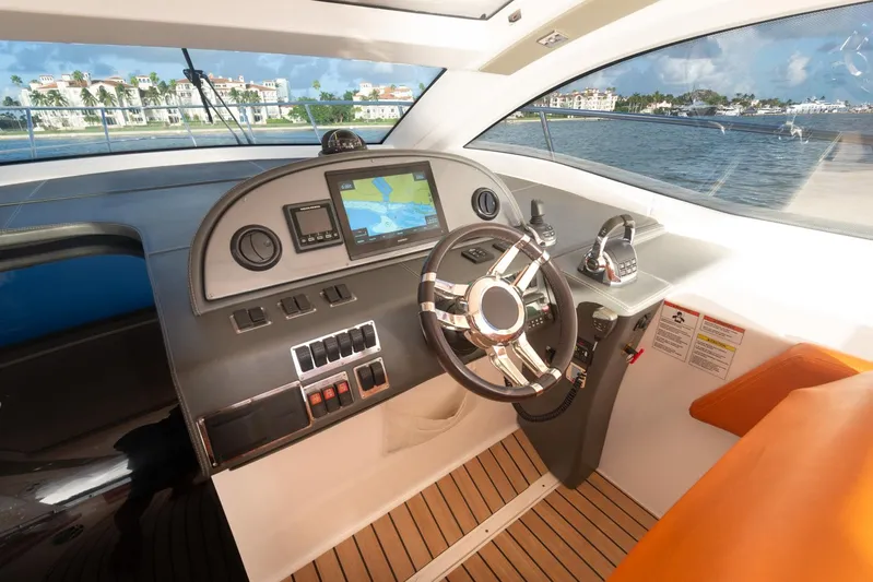  Yacht Photos Pics Cockpit of 2018 Schaefer 400 Sport yacht with modern navigation system.