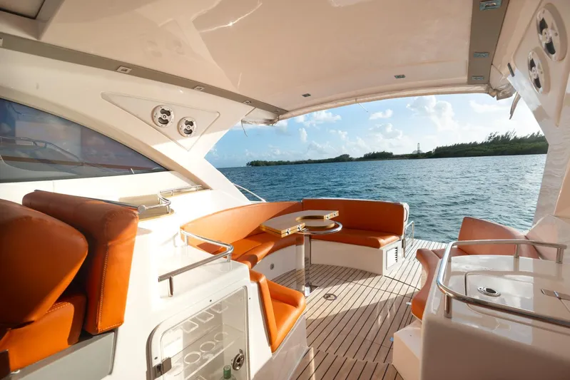  Yacht Photos Pics 2018 Schaefer 400 Sport yacht with orange seating and ocean view.