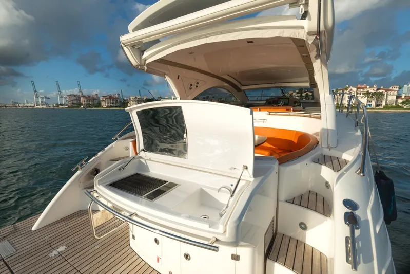  Yacht Photos Pics 2018 Schaefer 400 Sport yacht with open deck and waterfront view.