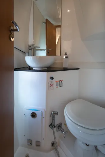 Yacht Photos Pics 2018 Schaefer 400 Sport yacht bathroom with modern sink and toilet.