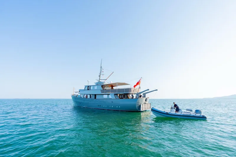 La Fenice Yacht Photos Pics 1962 Laurent Giles TSDMY Gentleman's Motor Yacht on serene blue waters.