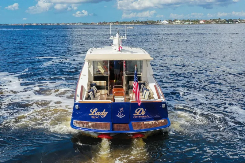 Lady Di Yacht Photos Pics 2007 Oyster LD43 yacht cruising on open water, rear view.