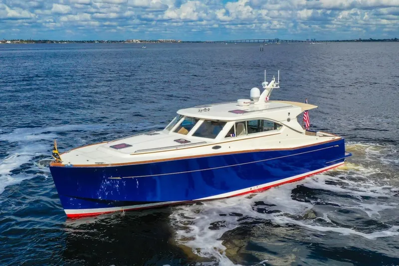 Lady Di Yacht Photos Pics 2007 Oyster LD43 yacht cruising on open water under a partly cloudy sky.