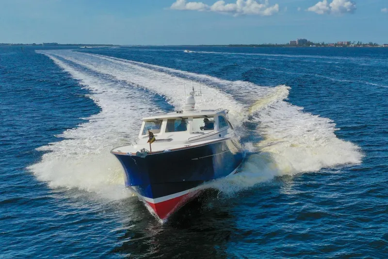 Lady Di Yacht Photos Pics 2007 Oyster LD43 yacht cruising swiftly on open blue water.
